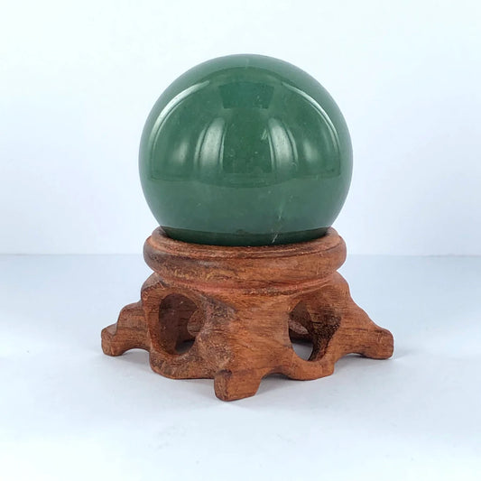 Carved Wooden Sphere Stands